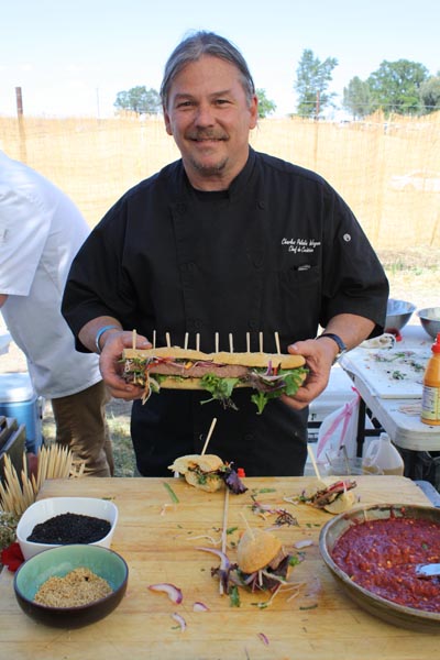 Chef Charles Wayne of Catering by Chef Charlie serves us tasty bites to hungry crowds. 