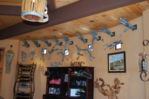 New artwork made from wine barrel metal on the walls of Wild Coyote.