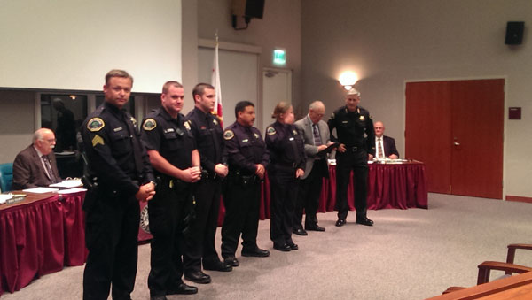 Sergeant David Opheim, at left, and his fellow police department staff members are recognized by the Paso Robles City Council on Tuesday night. Courtesy Photo.