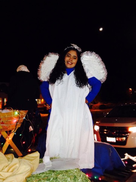 An angel adorns one of the many parade entries. Photo by Karina Lee Davis.