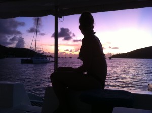 Katie Hayward reflects a postcard-perfect silhouette aboard a catamaran.
