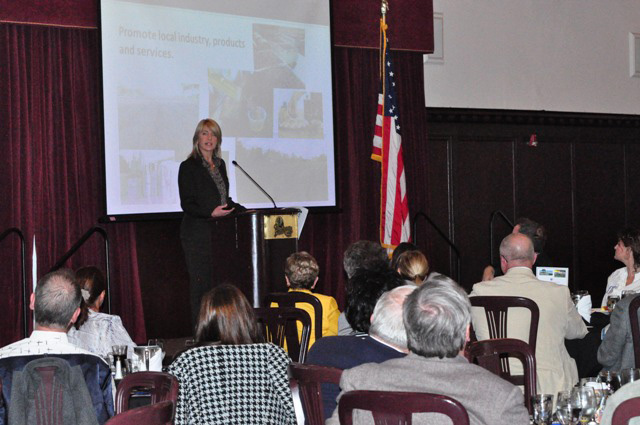 Paso Robles Assistant City Manager Meg Williamson addresses a large crowd of local business people at the Paso Robles Inn on Tuesday morning.