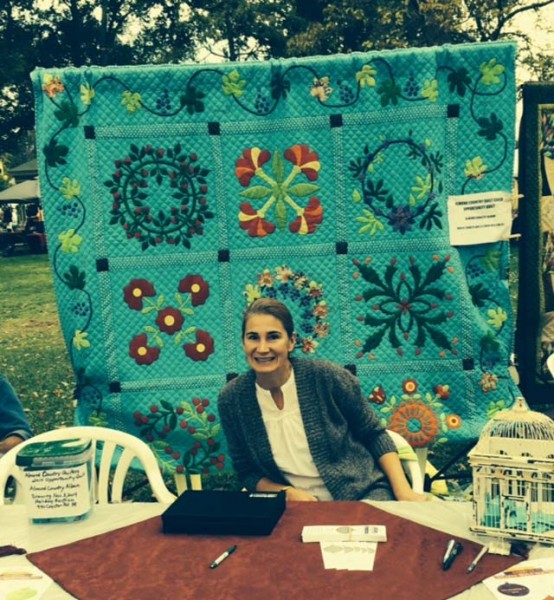 Dora Cary, the president of the Almond Country Quilters Club.