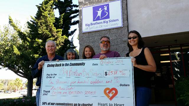 Pictured from left are Les & Muna Cristal of Templeton,  Mark McConnell and Liz Lee Marziello of Heart to Heart Real Estate present a check to Anna Boyd-Bucy of Big Brothers Big Sisters.