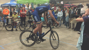 A competitor attempts to stand on his bike the longest. Photo by Heather Young