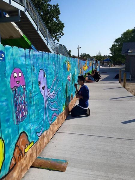Students work on the mural. Courtesy photo.