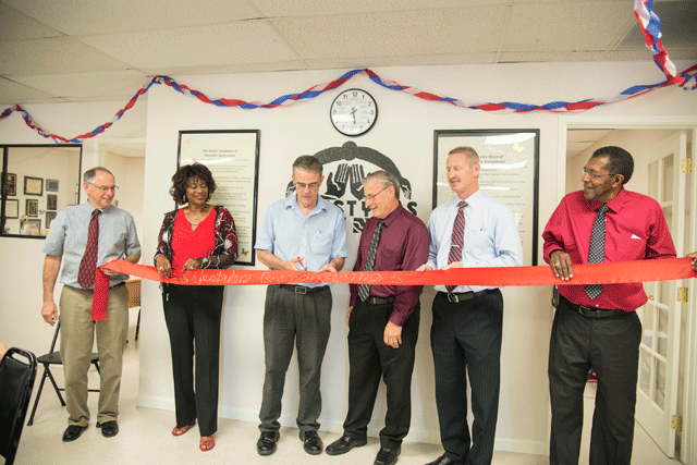 From left, Lifestyles Recovery Center, Inc. Board Member Chris Iversen, Executive Director Karolyn London, Paso Robles Mayor Steve Martin, Board President Mark Rehfield, Board Member Paul Press and Chief Financial Officer Eddie London cut the ribbon on the nonprofit's new location in Paso Robles  on Monday. Photo by Heather Young
