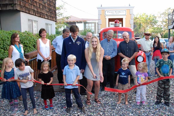 Riley and Mace Sherlock, Tom Martin's grand children, cut the ribbon unveiling the new structure at a special ceremony yesterday. Courtesy photo.