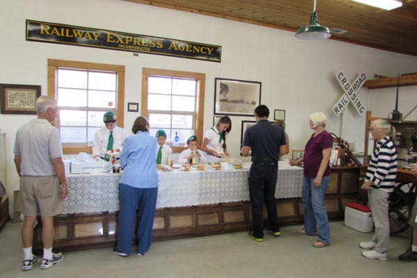 Pie and cake, compliments of the the Templeton Historical Museum Society, was another attraction. Volunteers from the Templeton 4-H Club served as quickly as possible as the line stretched from Main St. Into the the restored 1886 Railroad Warehouse.