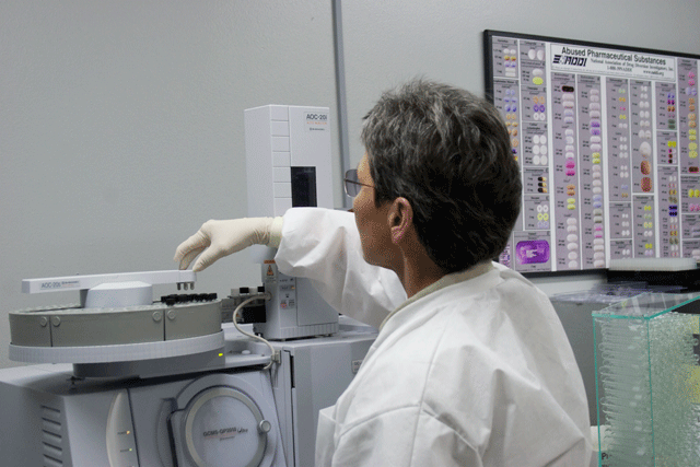 A Forensic Laboratory A A San Luis Obispo County Sheriff's crime lab specialist uses a Gas Chromatographer-Mass Spectrometer to analyze samples 