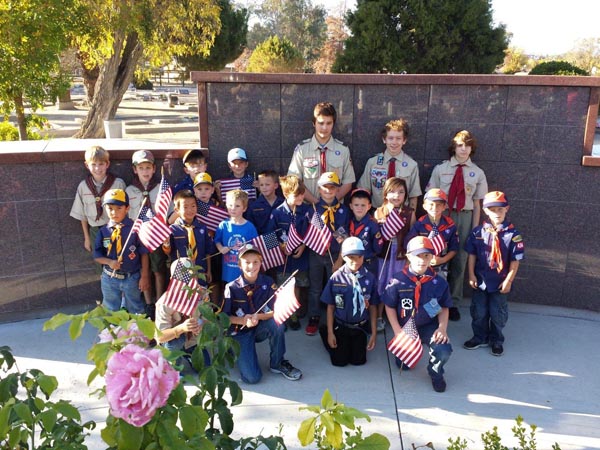 Cub Scouts and Boy Scouts from Templeton Troop and Pack 434 Decorating Graves of Veterens in Templeton