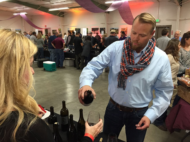 Winemaker Ryan Render pours a selection from his Rendarrio Vineyards