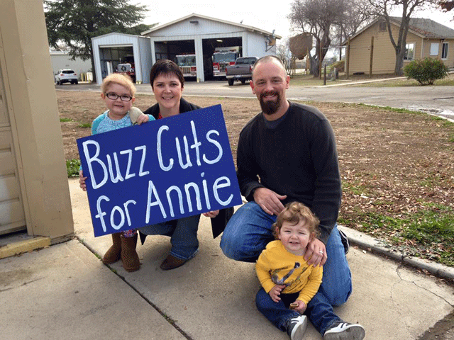 Annie Blake with her family at the buzz-a-thon to benefit her family.