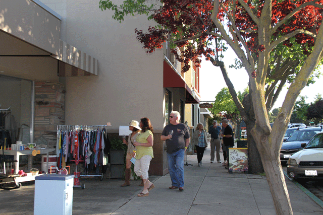 Attendees at Friday's Atascadero Art & Wine Tour stroll down Entrada Avenue. Photo by Heather Young