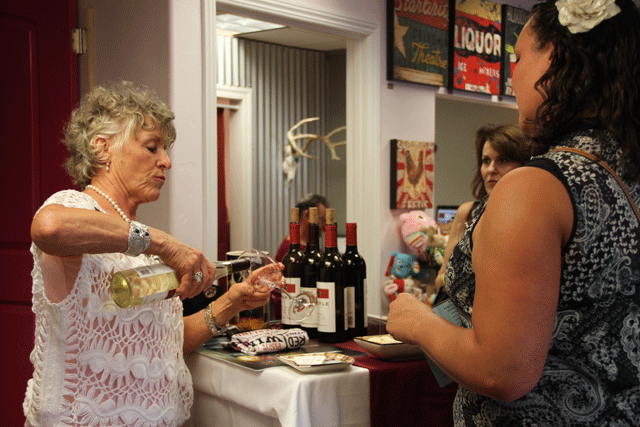Eberle wine is poured at Local Love Boutique on Entrada Avenue at Atascadero Art & Wine Tour on Friday. Photo by Heather Young