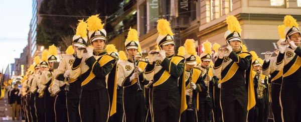 The Cal Poly Mustang Band performs on a street in San Fransisco. Photo by John Osumi.