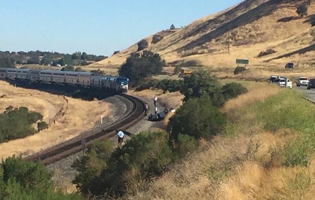 Photo of stopped Amtrak train by Meagan Friberg.