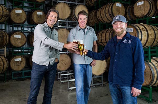 From L to R: David Walker, Adam Firestone and brewmaster Matt Brynildson. Photo from Wine Enthusiast. 