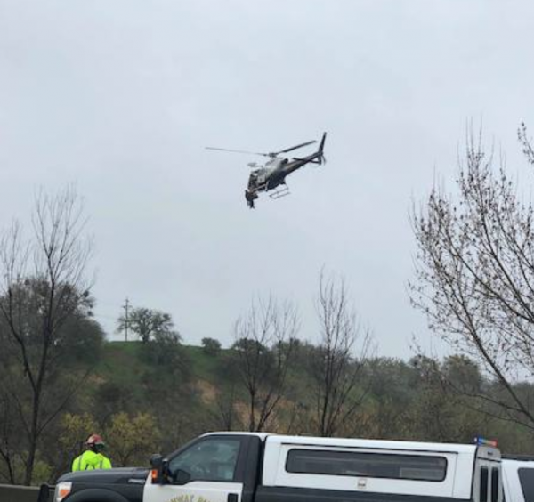 Helicopter rescue flooded riverbed paso robles