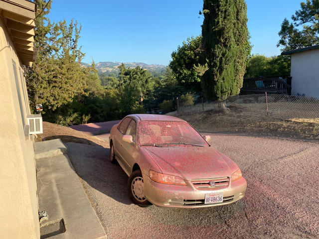 A car in the Capitol Hill neighborhood was covered with fire retardant dropped by fire fighting planes on Monday afternoon.