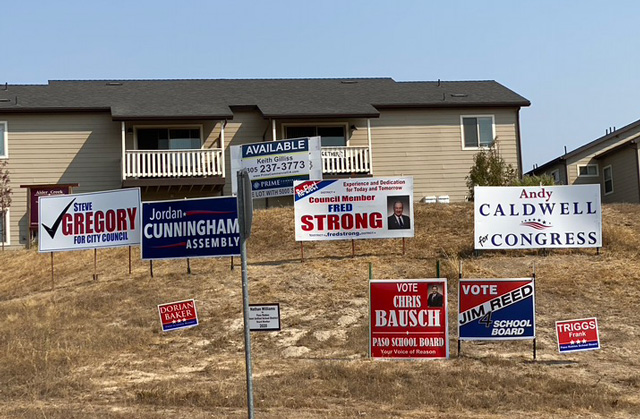 Campaign signs for Steve Gregory, jordan cunningham, andy caldwell, fred strong