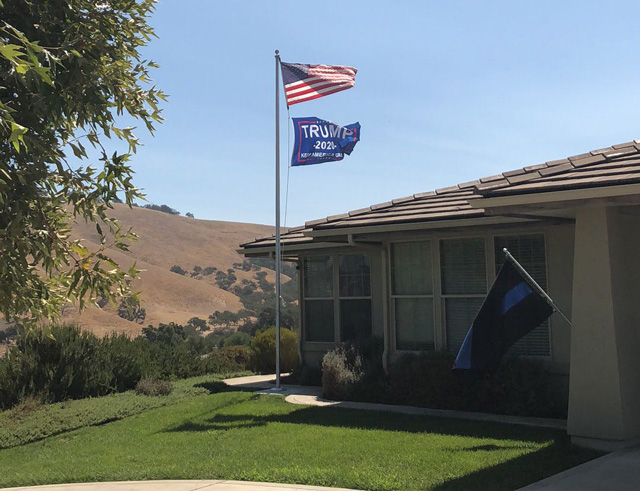 Trump supporter in Heritage Ranch flies a political flag 