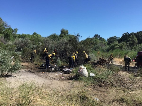 Firefighters extinguish riverbed fire Sunday afternoon in Paso Robles