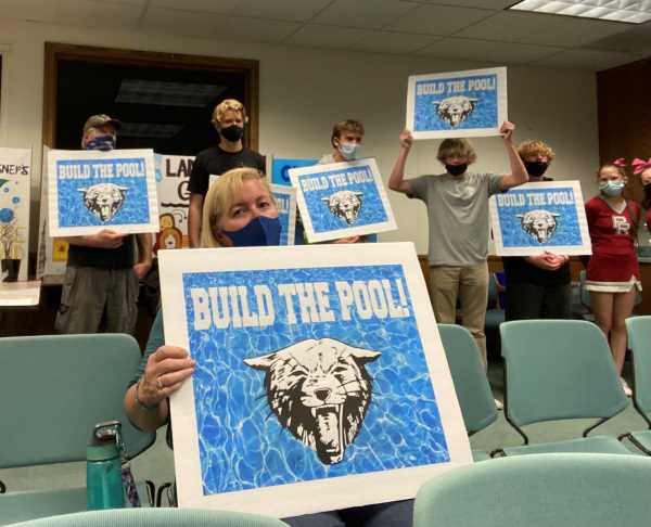 Pool demonstrators at board meeting