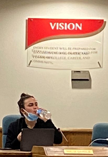 Gaviola drinks water at dais