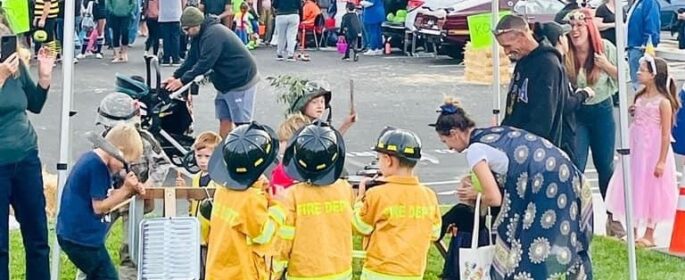 kids dressed as firemen
