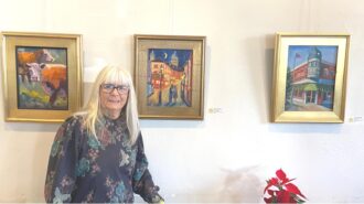 Margrete Koreska with her paintings