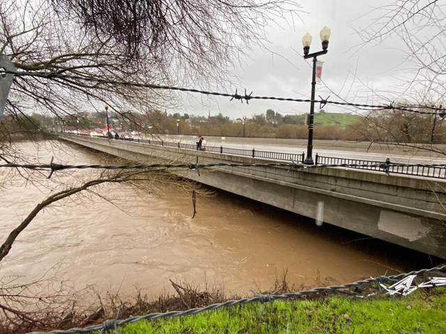 Photo of 13th Street Bridge in Paso Robles with Salinas River rising