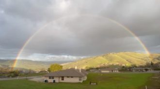 Rainbow over Heritage Ranch neighborhood on Sunday afternoon. Photo by Ryan Paine.