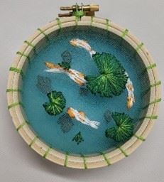 Craft a three-dimensional embroidered koi pond with the library 