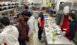 High school culinary students cater Rotary Club meeting