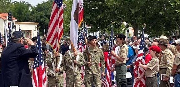 Cal Poly Color Guard enter Faces of Freedom Plaza