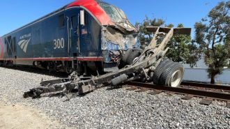 Amtrak train collides with work truck, 15 injured