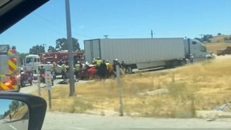 Kia driver crashes into semi truck, occupants suffer serious injuries