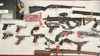 Felon arrested for possession of 24 firearms, ammo, explosive device