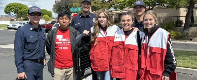 Paso Robles High School club members Alonso Mendoza, Maddie Williams, Lexi Keller, Hanna Fregang with local first responders.