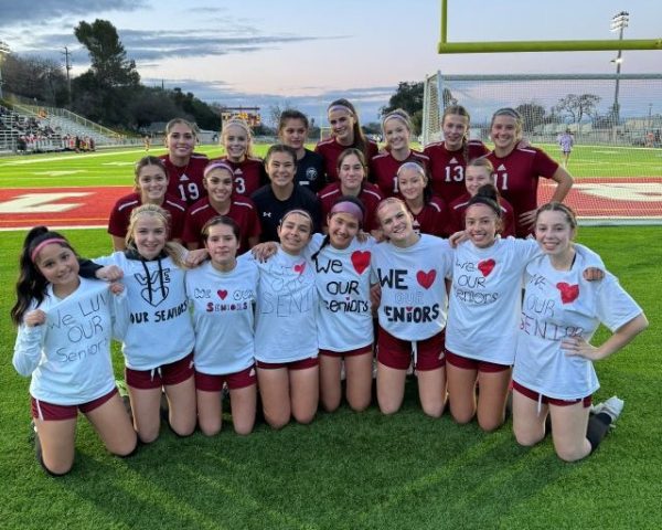High school girls soccer team wins league 