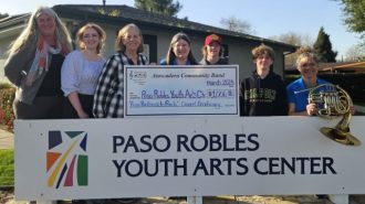 Photo caption: From left, Barby Wunsch, Executive Director of PRYAC, Natalie Cole, Development and Communications Coordinator, PRYAC, and Pat Bland, President of the Board of PRYAC, gratefully accept the donation from Atascadero Community Band members Beth Bean (Vice President of the band Board, trumpet), Jake Minnis (trumpet), Brennan Anderson (trombone) and Kata Linfield (French horn).