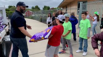 Lumber company delivers garden kits to schools
